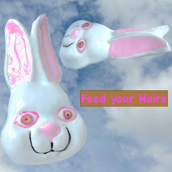 The Year of the Rabbit. Sterling Silver "Feed Your Haire" Pop Art Enameled Bunny Rabbit Face Necklace. Approx 2-1/4" by 1-1/2". Hand-signed. Comes with leather cord or vintage looking ribbon.Handmade and hand-enameled in the USA.