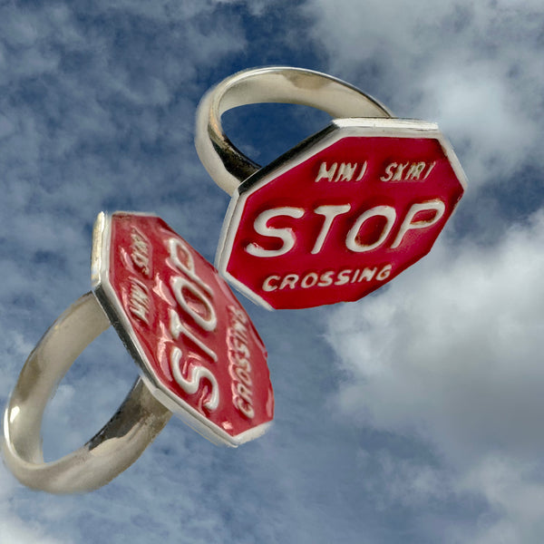 STOP in the name of love for MINISKIRTS! This whimsical tribute to the plastic 1960s Gum-Ball Rings is Handmade and Hand-Enameled Sterling Silver, and part of my new Sterling/Enamel line of fables/"stories".   Stands alone or looks FAB with any of our other fun rings!  Sterling Silver STOP SIGN approximately 1" x 1" at any angle. Red and White hand-enamel on SHINY Sterling Silver Back and Ring Shank. Sized 5-10. Email me for larger sizes. Nonbinary, as is all of my jewelry.