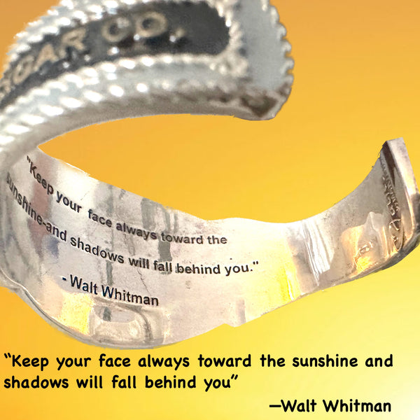 Inside this cuff, as with many of my new POP ART Collection, there is a hidden engraved quote--this one from Walt Whitman. These quotes are meant to resonate against your wrist and inspire you. I hope they do! This one: "Keep your face in the sunshine and shadows will fall behind you." POET Cheroot Cuff. Handmade, Hand-enameled Sterling Silver. Hand-signed. Approximately 6-1/2" Long by 2" (at center). Made in the USA! Nonbinary and designed to INSPIRE you!