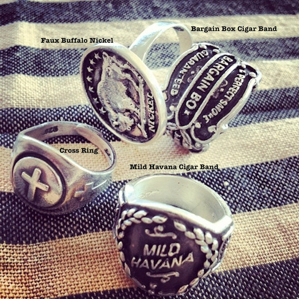Four of my best Sterling Silver Rings and the most whimsical silver jewerly on the planet. Faux Buffalo Ring, Bargain Box Cigar Band Ring, Mild Havana Cigar Band Ring, Cross Adjustable Ring. All from Fablesintheair by Marti Heil. Hand made in the USA. Hand signed by the artsit/designer.
