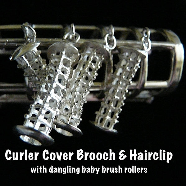 Sterling Silver Curler Cover Brooch. Approximately 2-1/2" x 1". Hand made in the USA. Hand signed.