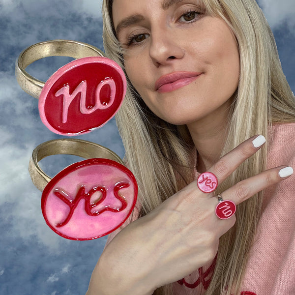 Love to make a controversial splash with your accessories? Sterling Silver YES or NO Enameled Gum-Ball Rings. Approximately 5/8” diameter. Handmade, Hand-enameled and Hand-Signed here in the good ole USA. Also available as Earrings, Cufflinks and Charm! The decision is YOURS.! Model: Paris Carney