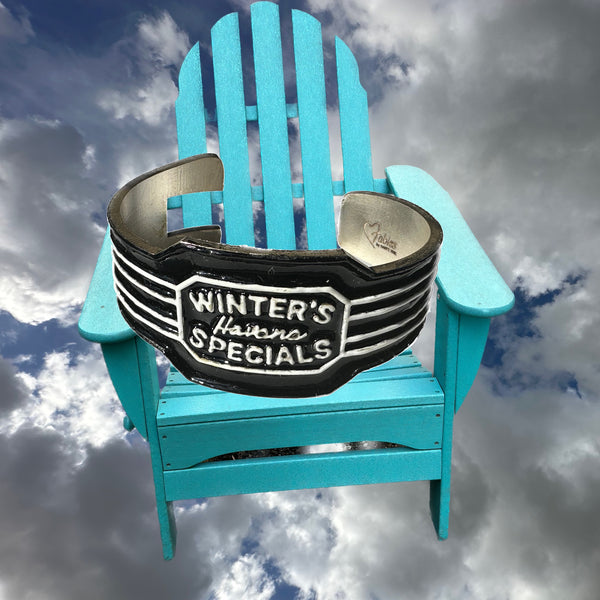 Layer these cuffs and try wearing them over a shirt cuff, sweater or jacket sleeve for an extraordinary artful look! Grab a French cuffed shirt and let the cuffs drape down on your hands and secure with one of these cuffs. Mix and match! WINTER'S HAVANA SPECIALS Hand-Enameled Sterling Silver Cuff. Approximately 6-1/2" long and 1-1/2" at center. Hand made in America. Hand signed. Timeless and Trend-setting simultaneously.