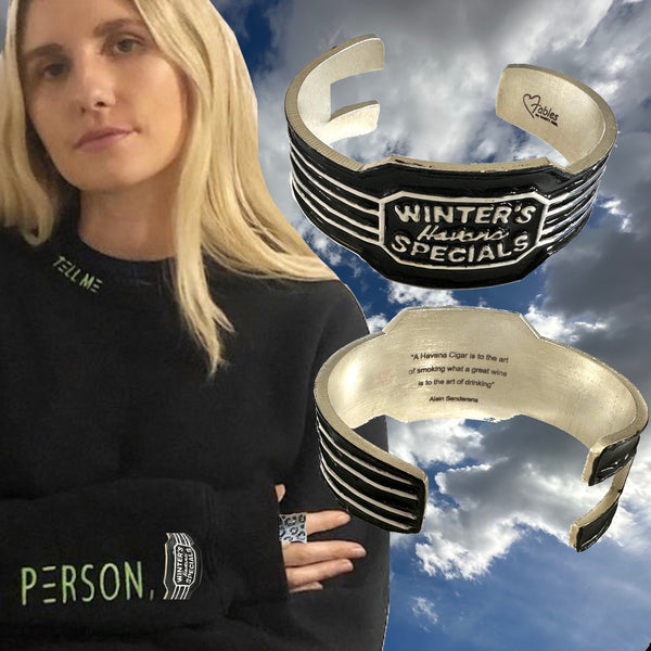 Layer these cuffs and try wearing them over a shirt cuff, sweater or jacket sleeve for an extraordinary artful look! Grab a French cuffed shirt and let the cuffs drape down on your hands and secure with one of these cuffs. Mix and match! WINTER'S HAVANA SPECIALS Hand-Enameled Sterling Silver Cuff. Approximately 6-1/2" long and 1-1/2" at center. Hand made in America. Hand signed. Timeless and Trend-setting simultaneously.