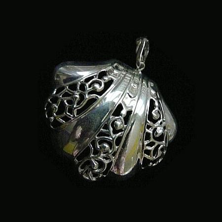 This large openwork scalloped seashell makes a beautiful choker...or, wear it as a single charm on a linked bracelet... for an eye-catching piece of whimsy. Sterling Silverr Clam on the Half Shell Charm. Handmade in America with love, and hand-sgned. Accompanied by a long leather cord or vintage inspired ribbon. 2-1/2" x 2-1/4" Also available as shoe clip.