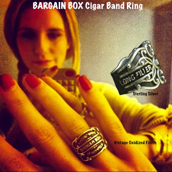 Vintage antique cuban cigar bands come to life as Sterling Silver Cigar Band Rings in 3D fashion statements. Shown here on talented musician/composer/recording artist, Paris Carney. O'Neill is her new musical project.And she just opened for Reeve Carney at his new "Truth" solo album record release.
