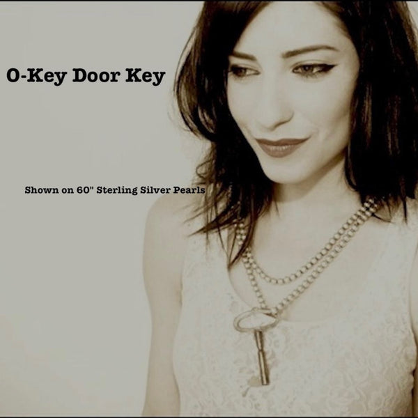 here is a reason these "pearls" are a Fables "Classic". Whether you like Jackie Kennedy or Prince, you should own this extra-long Sterling Silver Pearl necklace with its heart clasp. If you can only take one accessory on any trip, let it be this versatile strand of Silver Pearls.(It is also a perfect gift for a bride!) A generous 5 feet of 7mm Sterling Silver Pearls with a heart clasp. Hand made in the USA. Hand Signed.