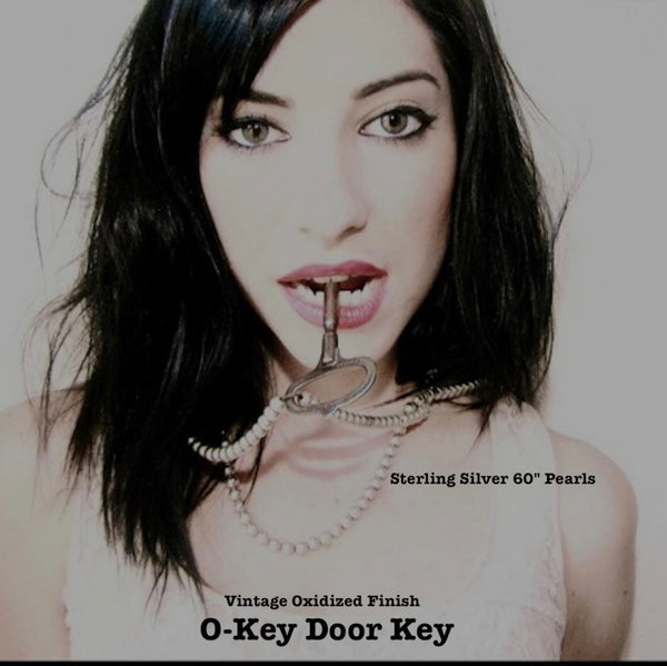 here is a reason these "pearls" are a Fables "Classic". Whether you like Jackie Kennedy or Prince, you should own this extra-long Sterling Silver Pearl necklace with its heart clasp. If you can only take one accessory on any trip, let it be this versatile strand of Silver Pearls.(It is also a perfect gift for a bride!) A generous 5 feet of 7mm Sterling Silver Pearls with a heart clasp. Hand made in the USA. Hand Signed.