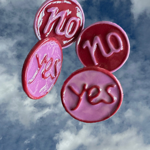 Decisions, DeCISIONS! Having trouble making up your mind? Firm in your resolve? Having a wishy-washy day? Or are you a beacon of positive energy?Love to make a controversial splash with your accessories? Sterling Silver YES/NO Earrings. Approximately 5/8” diameter with Sterling Silver Posts. Handmade, Hand-enameled and Hand-Signed here in the good ole USA. (Also available in Gum-Ball Ring, Cufflinks and Charm!