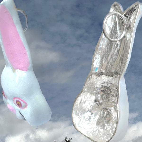 The Year of the Rabbit. Sterling Silver "Feed Your Haire" Pop Art Enameled Bunny Rabbit Face Necklace. Approx 2-1/4" by 1-1/2". Hand-signed. Comes with leather cord or vintage looking ribbon.Handmade and hand-enameled in the USA.