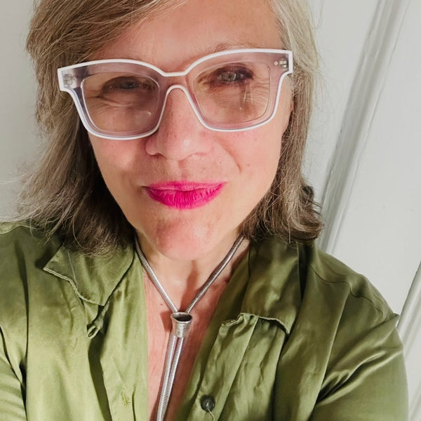 Sterling Silver Dented Thimble Bolo Necklace with tiny dented bolo tips on fablesintheair owner/designer, Marti Heil