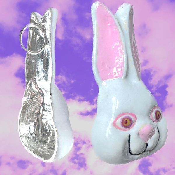 The Year of the Rabbit. Sterling Silver "Feed Your Haire" Pop Art Enameled Bunny Rabbit Face Necklace. Approx 2-1/4" by 1-1/2". Hand-signed. Comes with leather cord or vintage looking ribbon.Handmade and hand-enameled in the USA.
