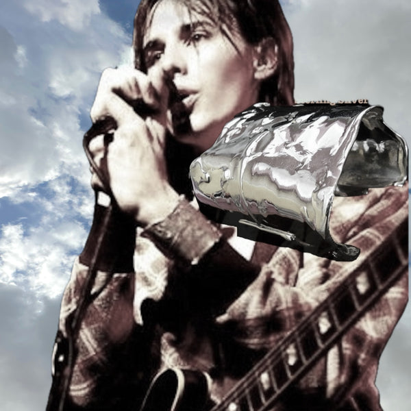 Iconic , Organic, Award-Winning Sterling Silver Scissorhands Cuff. Approximately 2-3/4" high but 7 inches from extended pieces---approximately 6" end to end before extender begins .Hand made in the USA. Hand-signed.Here, on actor/composer/musician Reeve Carney.