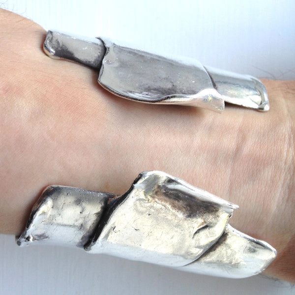 Iconic , Organic, Award-Winning Sterling Silver Scissorhands Cuff. Approximately 2-3/4" high but 7 inches from extended pieces---approximately 6" end to end before extender begins .Hand made in the USA. Hand-signed.