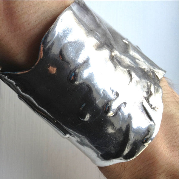 Iconic , Organic, Award-Winning Sterling Silver Scissorhands Cuff. Approximately 2-3/4" high but 7 inches from extended pieces---approximately 6" end to end before extender begins .Hand made in the USA. Hand-signed.
