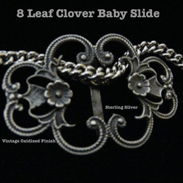This curvy little oxidized piece is one of my 4 "baby slides" and is dotted by two beautiful perfect tiny flowers. Slip in several strands of suede cord or one of your own collection of velvet, grosgrain, whatever 5/8" ribbons, or even several choker length chains at one time and you have a variety of looks, each uniquely feminine. I made these very affordable, so that you can have a couture look by collecting the four and slipping them, one by one, side by side, (and perhaps mix the finishes!) onto your ch
