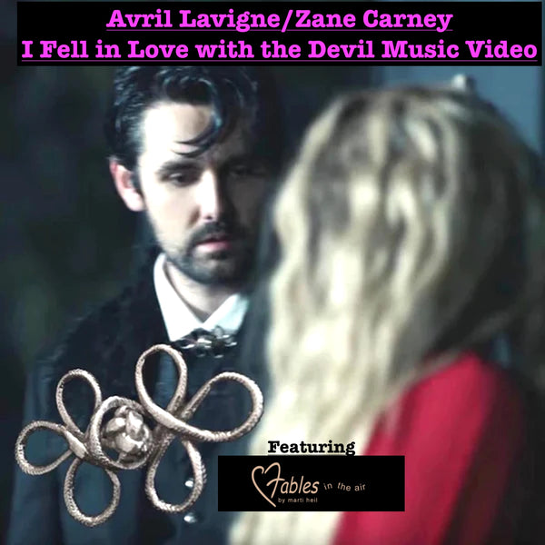 Featured in Avril Lavigne's "I Fell in Love with the Devil" video, consider this timeless piece in lieu of a tie./ From a more genteel time. Sterling Silvr "Frog" Braided Toggle Brooch. Approximately 2-3/4" x 1-5/8" Hand made in America with a story of my own. Hand-signed. 