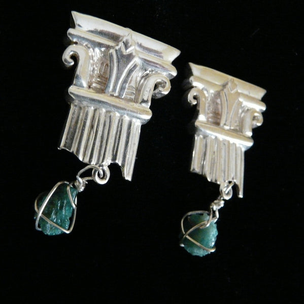 A more delicate version of my Sterling Silver Broken Column earring--THIS one is just the broken TOP, and dangling from it is a chunk of Jade... A more tailored earring for the less bold woman who still likes to make a statement. Perfect for day OR evening wear.   Approximately 1"x 1". Hand made in the USA. Hand signed.  Sterling Silver Broken Column Top Earrings with dangling chunks of Genuine Jade.