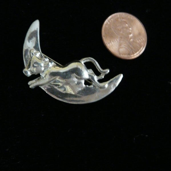 It DID and a picture's worth a thousand moos! This is the sweetest little nursery pin and don't miss the earrings of the same which is also here on my site. The spoon is totally engravable  and great to get as a gift or to treat yourself.  1" approximately. Made in the USA. Hand signed.  Sterling Silver "The Cow Jumped over the Moon" Nursery Pin. Perfect for the new Mama to wear and pass on to her baby when the time is right.