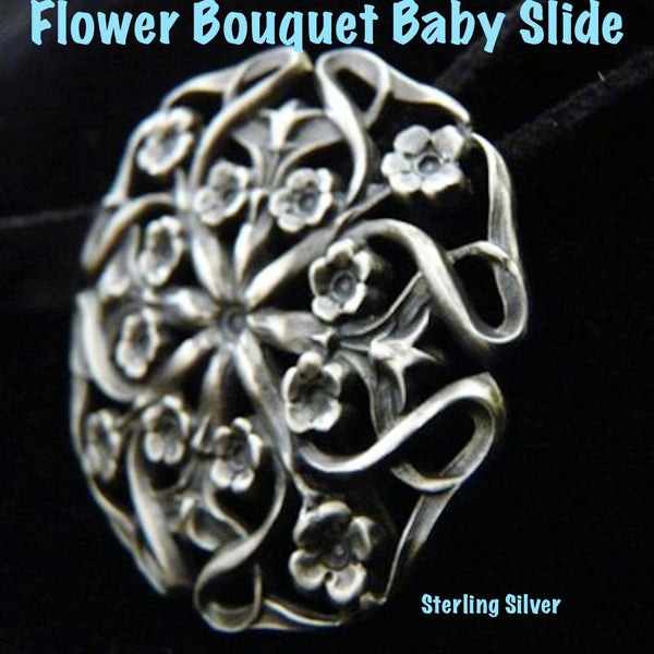 Like wearing a bouquet. Beautifully oxidized Sterling Silver Circular Flower Bouquet with openwork between the flowers for a spectacular look when you weave a chain or two through the slide