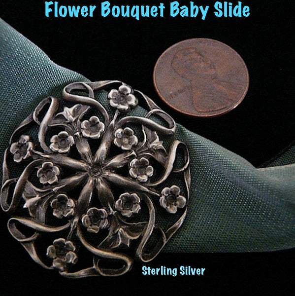 Like wearing a bouquet. Beautifully oxidized Sterling Silver Circular Flower Bouquet with openwork between the flowers for a spectacular look when you weave a chain or two through the slide