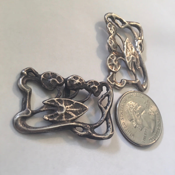 This is one Lily Pad which requires no frog-to-prince to transform its wearer to beautiful maiden status. Slide wired ribbon, leather cord or delicate chains and it becomes a different necklace.