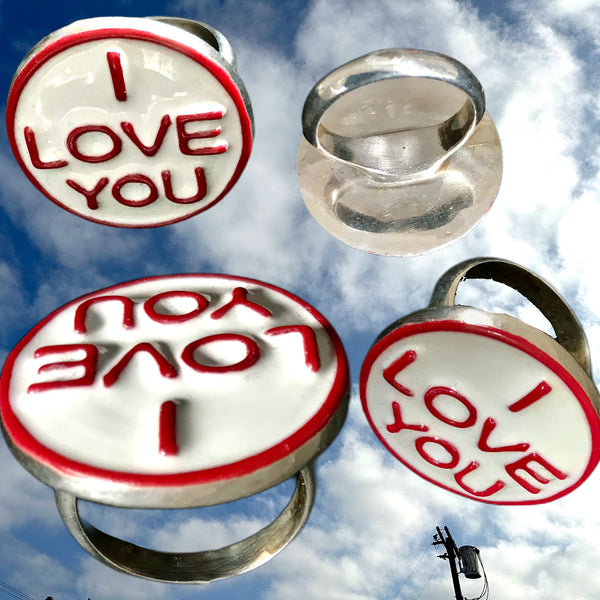Sterling Silver I LOVE YOU Ring. Offer LOVE into the world! On days you’re feeling insecure, turn it around to face you. Approximately 1 inch in diameter. Custom Handmade and Hand-Enameled, in America. Hand-signed by me.