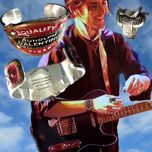 Rudolph Valentino Enameled Sterling Silver Cheroot Cuff. Approximately 6-3/8"x1-5/8"x 6/8" . Hand Made, Hand Enameled and Hand Signed in America. Shown here on actor, guitarist, sing/songwriter, Zane Carney.We ship all over the world.