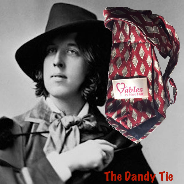 The Dandy Tie.  Each is a ONE OF A KIND and HANDMADE,by me, out of recycled neckties I handpick because of their texture or color or print. Created for men AND women, and designed to be worn for a lifetime, because of their timeless elegance, you are guaranteed to never see another like yours. Completely adjustable, the Dandy Tie is meant to be worn with or without a shirt. Use your own imagination!