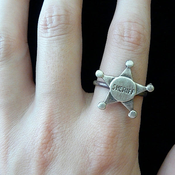 Andy Griffith and Don Knotts as Andy Taylor and Barney Fife with Fablesintheair's Sterling Silver Adjustable Sheriff's Star Ring. For the cowboy or cowgirl in us all. Sterling Silver Sheriff's Star Adkistable Ring. Sheriffs usually keep their stars bright and shining and this whimsical gumball ring is no exception, with a little smudge of oxidization to showcase the detail.