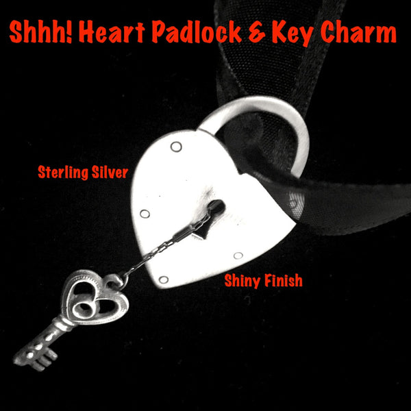 Fablesintheair.com Sterling Silver "Shhh! Padlock Heart & Key Charm. Shiny Finish.It takes a lot of trust to dangle the key to one's heart so near the protective lock, but what fun is playing it safe in love? Sterling Silver Heart Padlock and tiny Victorian key, hanging by a beautiful strand of Sterling Silver chain. Hey, a little mystery is always good.  So is a little Mambo Italiano.
