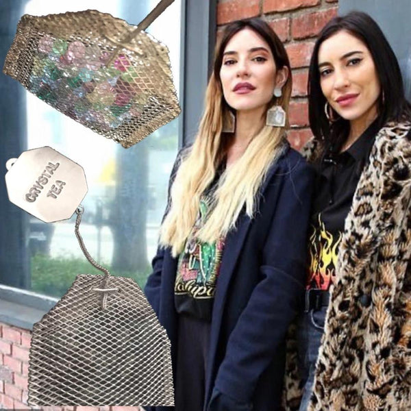 On Lisa Origliasso of The Veronicas-Sterling Silver mesh teabags filled with Austrian Crystals, hanging by a sterling silver foxtail "thread" from a Sterling Silver "Paper" "Crystal Tea" tag.3" x 1-5/8" approximately  Handmade in the USA. Hand Signed