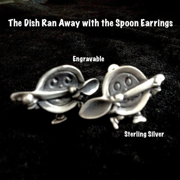 You know the drill. It started with the mouse and, well...if you were a dish and a spoon, wouldn't YOU run away if you heard a dog laughing? Seriously. A mirrored pair of adorable earrings. Also available in pin which makes a perfect baby gift. (for the mother first, with name engraved on spoon handle!)  1-1/2" by 3/4" approximately. Hand made in the USA. Hand signed.  Sterling Silver Earrings of The Dish Ran Away with the Spoon-a right and a left. In either Sterling Silver clipbacks or pierced.