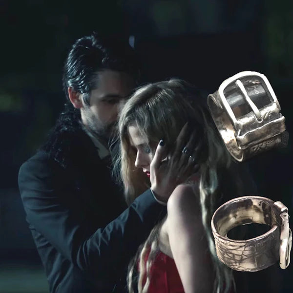 Substantial piece of pure vintage rock and roll--as seen on Zane Carney, in Avril Lavigne's "I Fell in Love with the Devil"Music Video.. Opulent,finely detailed band of timeless whimsy in Oxidized Sterling Silver Buckle Ring makes a statement alone or as part of a collection of fables...Sterling Silver distressed Crocodile textured buckle ring. Handmade in America and Hand-signed.  Edit alt text