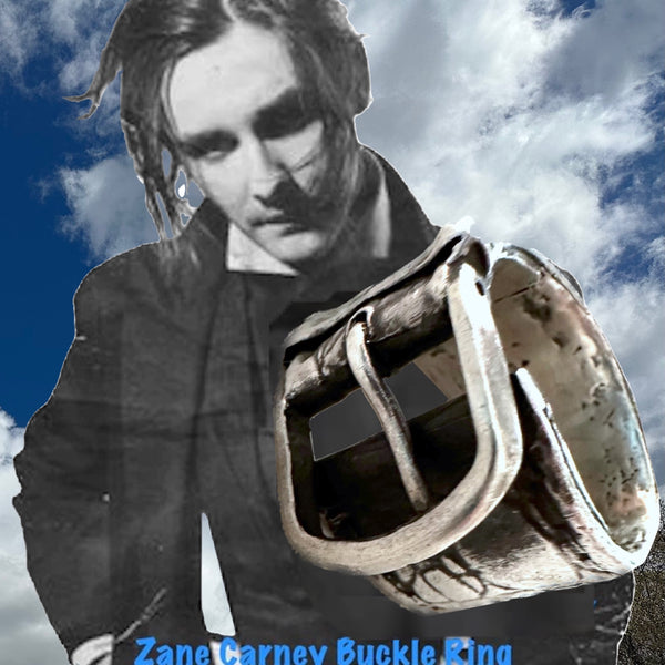 Substantial piece of pure vintage rock and roll--as seen on Zane Carney, in Avril Lavigne's "I Fell in Love with the Devil"Music Video.. Opulent,finely detailed band of timeless whimsy in Oxidized Sterling Silver Buckle Ring makes a statement alone or as part of a collection of fables...Sterling Silver distressed Crocodile textured buckle ring. Handmade in America and Hand-signed.