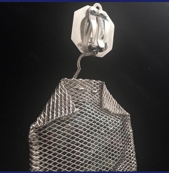 Sterling Silver mesh teabags filled with Austrian Crystals, hanging by a sterling silver foxtail "thread" from a Sterling Silver "Paper" "Crystal Tea" tag.3" x 1-5/8" approximately  Handmade in the USA. Hand Signed